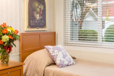 Cozy private room with floral decoration and sunlight
