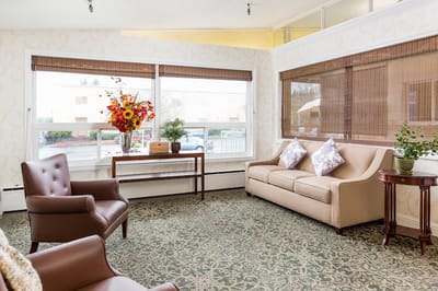 Bright common area with comfortable seating and decor