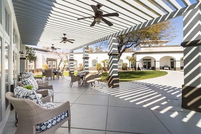 Patio area with seating and shaded overhead