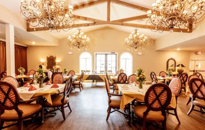 Elegant dining room set up for dining.