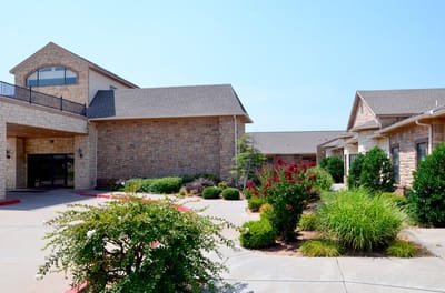 Entrance and garden area of Meadow Lake Assisted Living