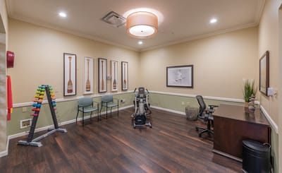 A well-equipped exercise room inside the facility
