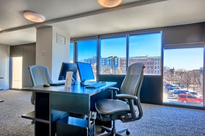Bright modern office space with large windows