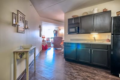 Interior view of a resident room with kitchen