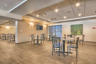 Interior dining area with tables and chairs