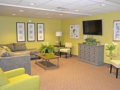 Cozy common area with seating and decor.