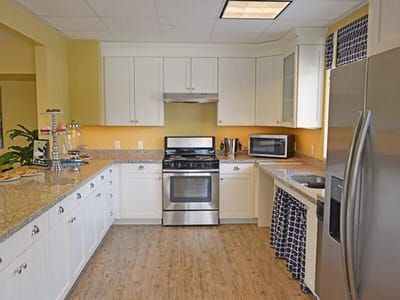 Bright kitchen area with modern appliances