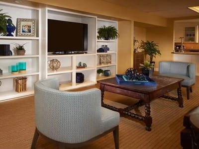 A cozy common area with seating and decor