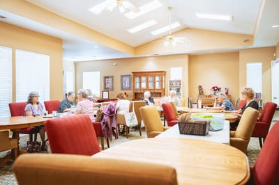 Residents engaged in conversation in a common area