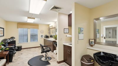 Interior view of a salon space with styling chairs