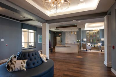 Interior view of a stylish common area with seating