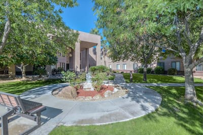 Outdoor area with landscaped garden and paths