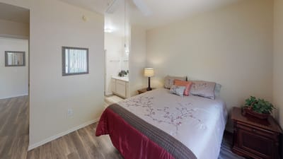 Cozy bedroom with elegant decor in a senior living facility
