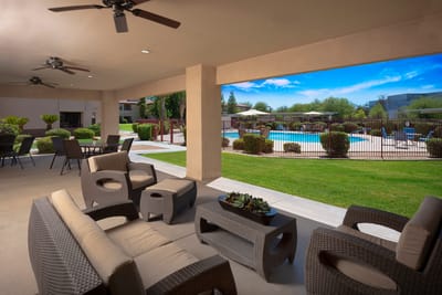 Outdoor lounge area overlooking the pool