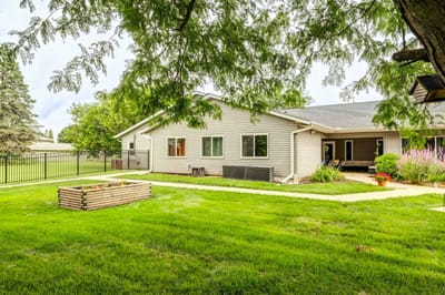 Exterior view of Dimensions Living Appleton with garden