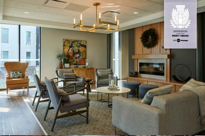 Bright common area with seating and decor