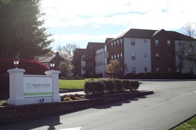 Exterior view of Cedar Woods facility entrance