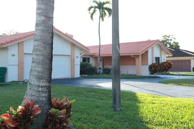 Exterior view of a residential building in a landscaped area