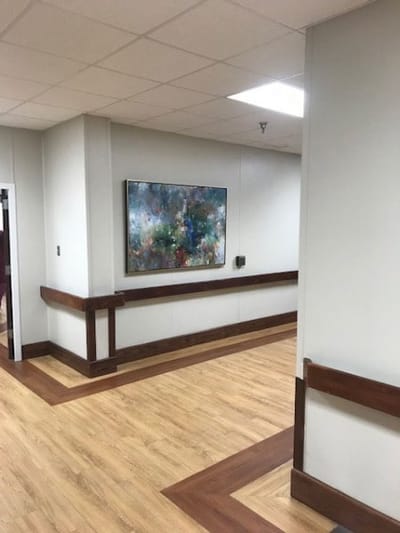 Interior hallway featuring abstract artwork