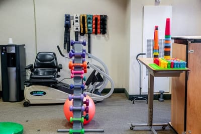 Physical therapy equipment in an activity room