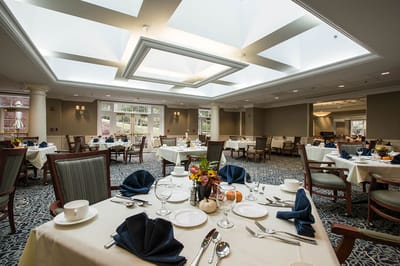 Bright dining room with elegant table setting