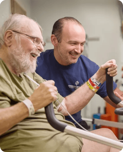 Resident and staff member engaging in therapy session