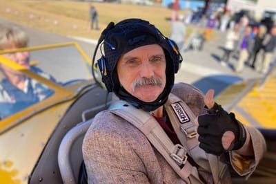 Landmark Nursing & Rehabilitation Ctr of West Mon, Nursing Home in West Monroe, LA — Senior resident giving a thumbs-up in an airplane cockpit