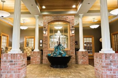 Common area with a brick design and seating