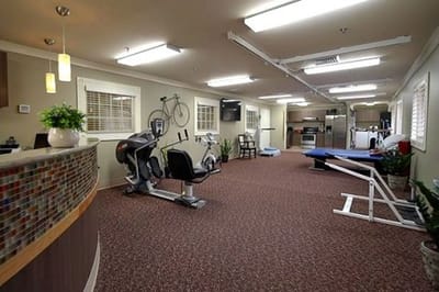 Interior view of a fitness area with exercise equipment