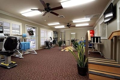 Interior view of a fitness room with exercise equipment