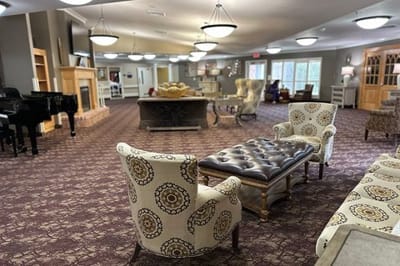 Interior view of a spacious common area with seating
