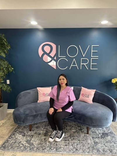 Staff member seated in a welcoming common area