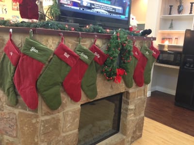 Christmas stockings hanging by the fireplace