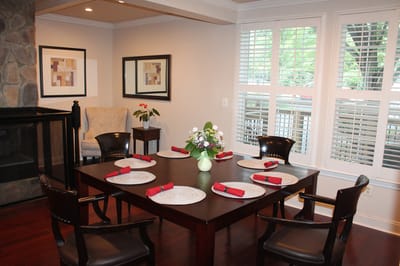 Elegant dining area with a table set for meals