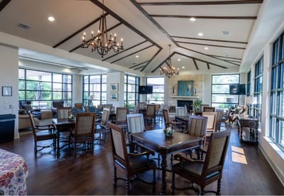 Bright dining area with tables and seating