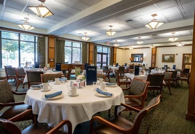 Dining room set up with tables and chairs