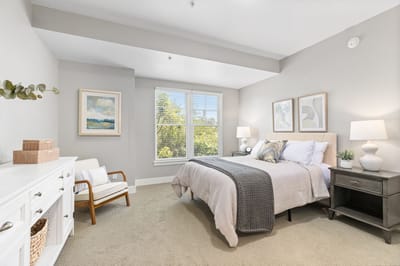 Bright and inviting resident bedroom with natural light