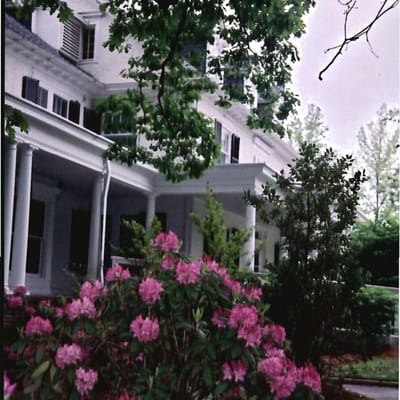 Exterior view of the assisted living facility with flowers