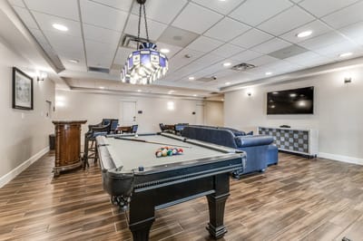 Interior common area with pool table and seating