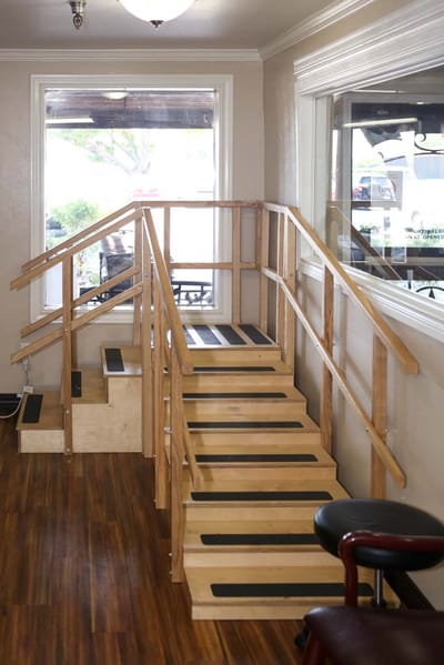 Interior view of a staircase with handrails