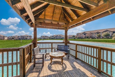 Outdoor gazebo overlooking a serene lake