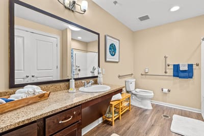 Clean and modern bathroom with vanity and storage