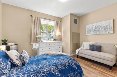 Cozy private bedroom with blue floral bedding