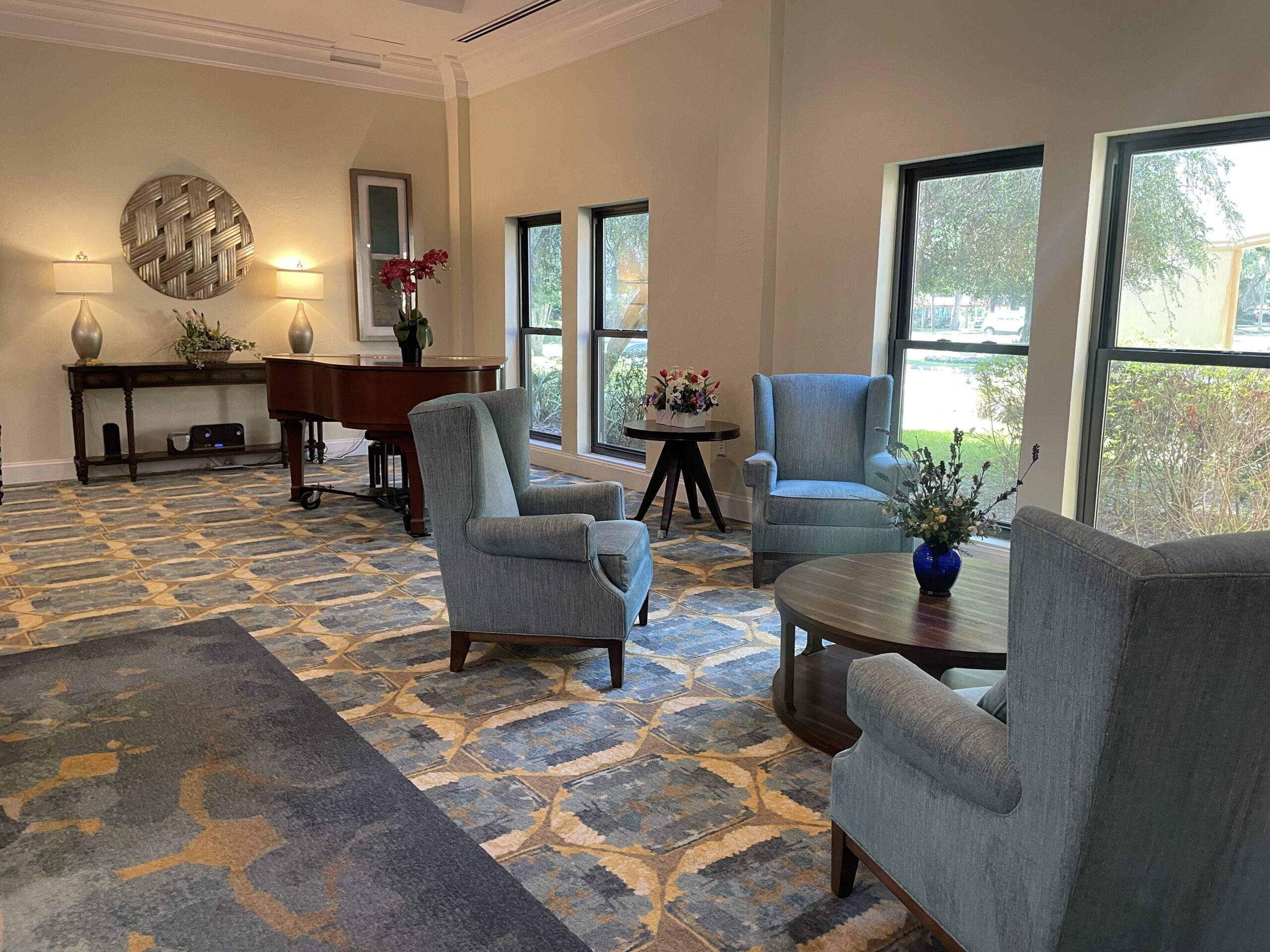 Interior common area with seating and natural light