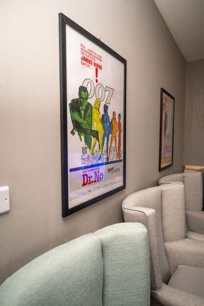 Lound Hall Nursing Home, nursing home — Framed retro movie poster on a gray wall