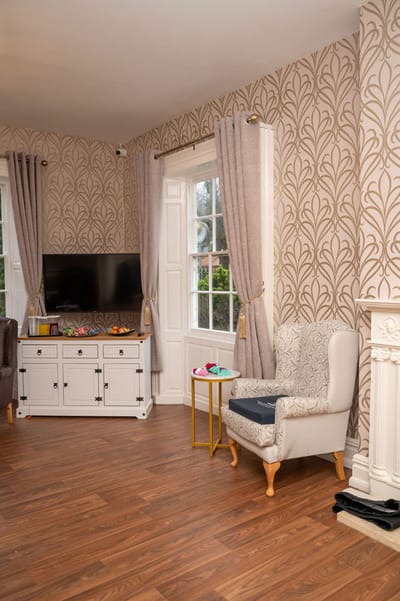 Common area with comfortable seating and television