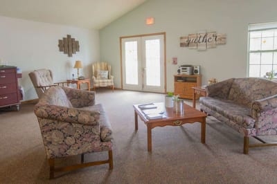 Bright common area with seating and decor