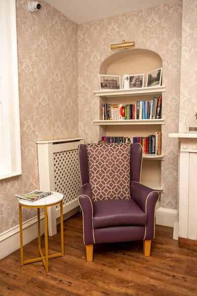 Cozy seating area with bookshelves
