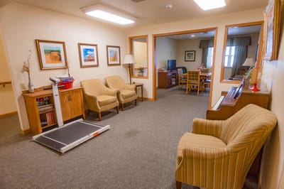 Interior view of a cozy common area with seating