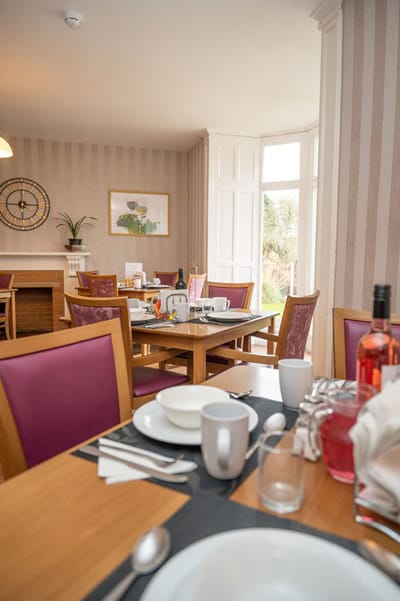 Bright dining room table set for a meal